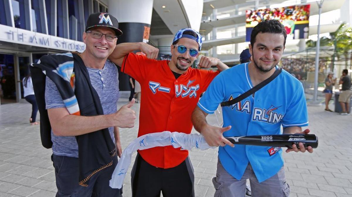 Lee Ratliff, Chris Ratliff and Edgar Torres, left to right, enjoy Marlins FanFest 2017 at Marlins Park on Feb. 11, 2017.
