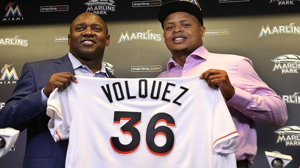 Newly-signed Marlins pitcher Edinson Volquez, right, has dealt with family tragedy twice in the past 18 months. His brother was murdered early Tuesday morning, and his father died during the 2015 World Series.