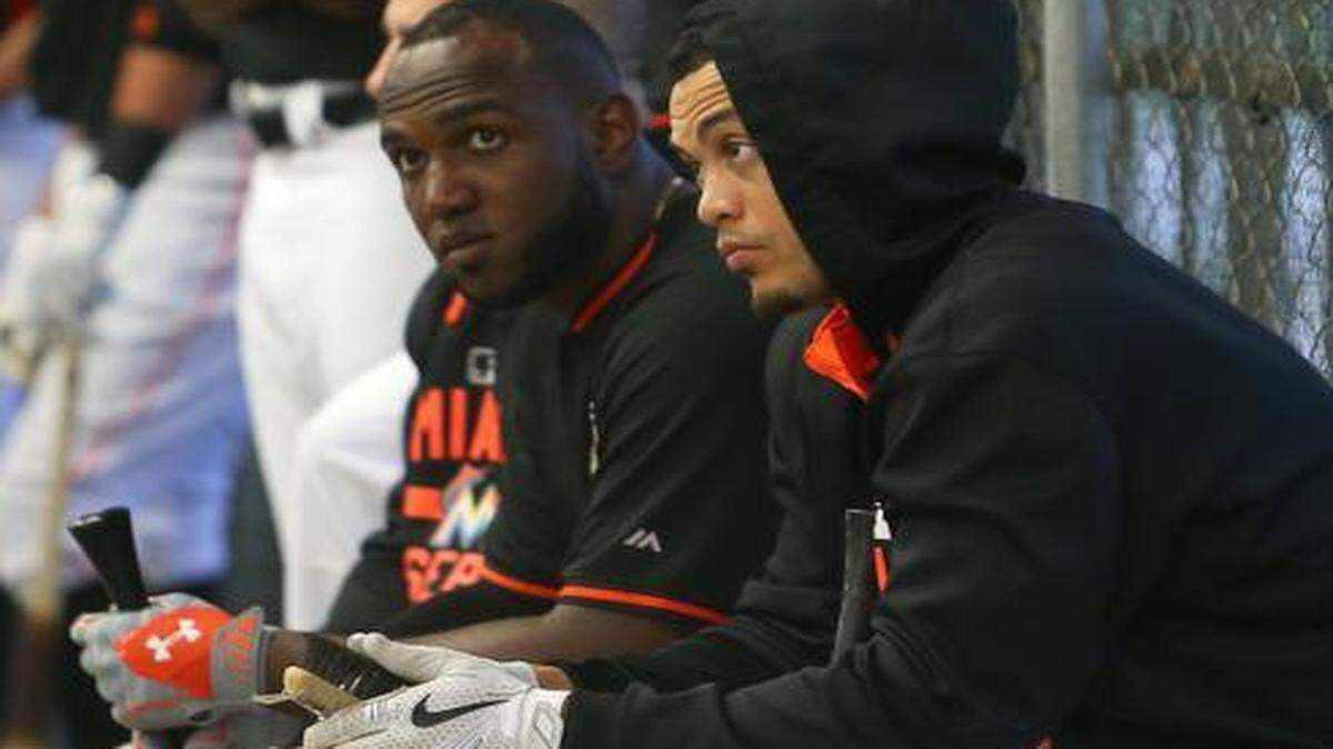 
Marlins star outfielder Giancarlo Stanton, right, wasn’t injured when he was hit on the left hip by a Henderson Alvarez pitch on Saturday.
