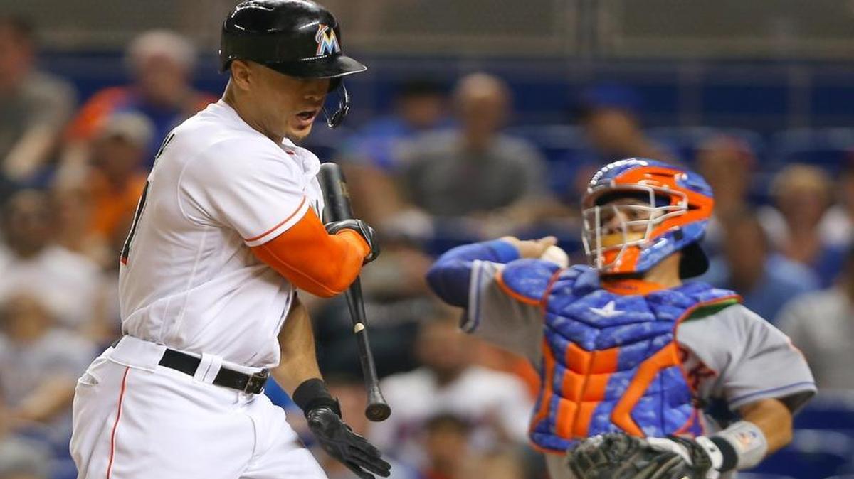 Miami Marlins right fielder Giancarlo Stanton reacts after striking out swinging during the fourth inning of the game against the New York Mets on Fri., June 3, 2016 at Marlins Park in Miami.