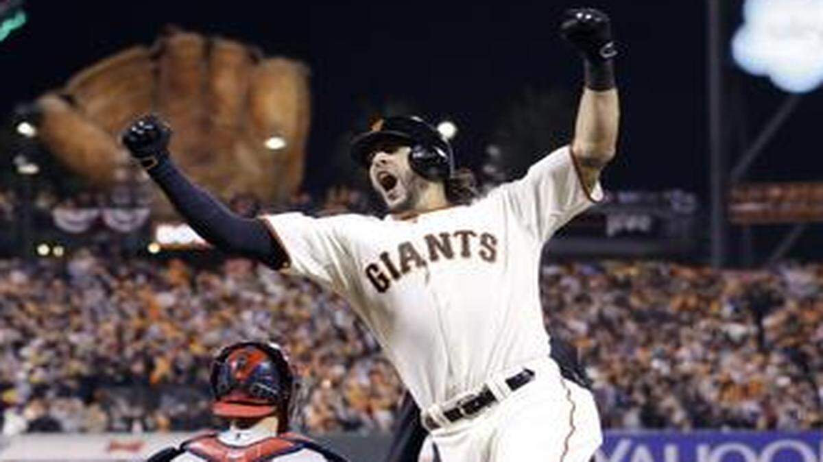 
Michael Morse celebrates after his game-tying homer in the eighth inning of the Giants’ Game 5 series-clinching win against St. Louis in the NLCS. 
