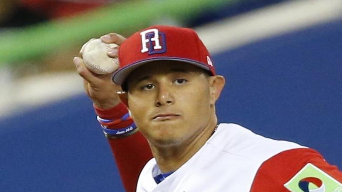 Dominican Republic infielder Manny Machado (3) throws to first base as Canada plays Dominican Republic in the World Baseball Classic at Marlins Park in Miami on March 9, 2017.