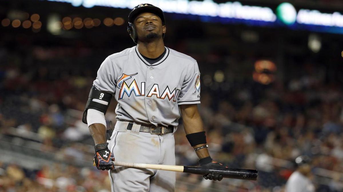
Miami Marlins' Dee Gordon reacts after a strike while batting during the ninth inning of a baseball game against the Washington Nationals at Nationals Park in Washington on Sept. 18, 2015. The Nationals won 5-4 in 10 innings.

