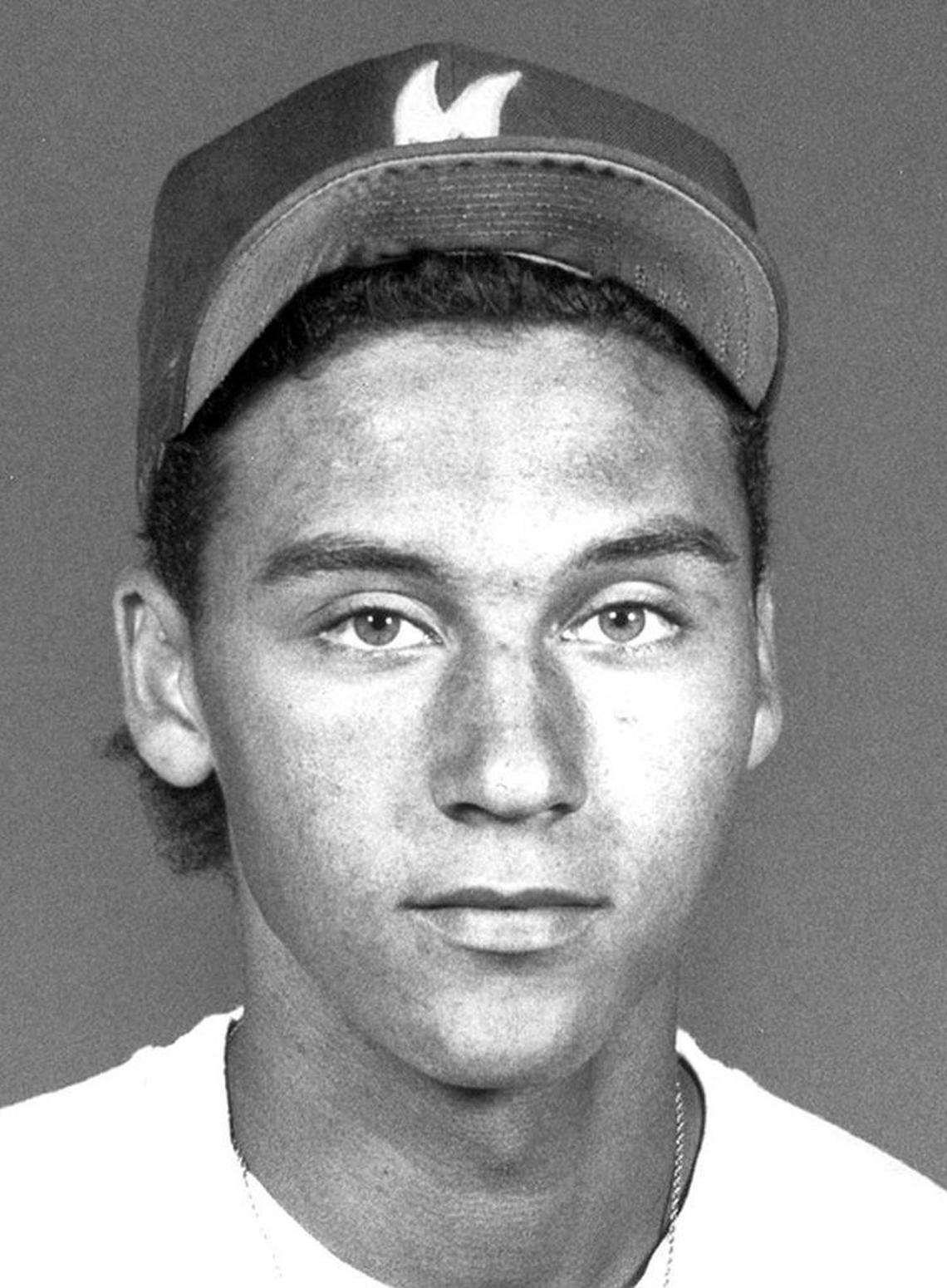 In this photo taken in the early 1990s, Kalamazoo Central baseball player Derek Jeter poses in his hometown of Kalamazoo, Mich.