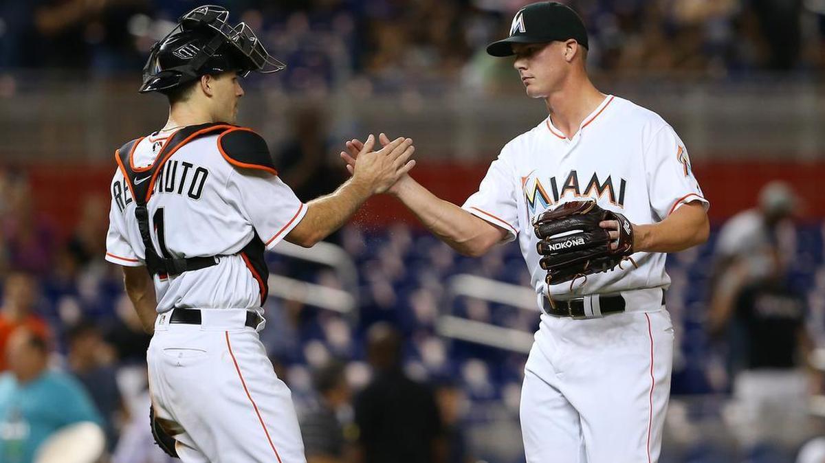 Miami Marlins pitcher Austin Brice pitches celebrates with catcher J.T. Realmuto after defeating the Philadelphia Phillies 6-0 in a game on Wed., Sept. 7, 2016 at Marlins Park in Miami.