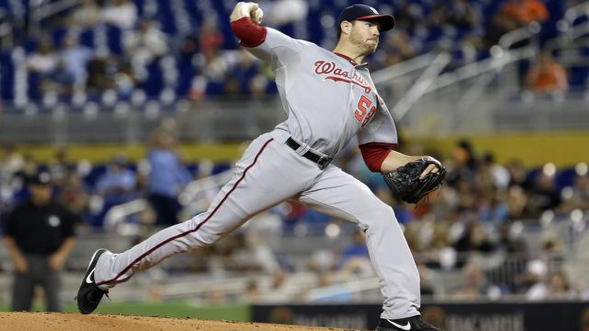 
Washington Nationals' Doug Fister pitches against the Miami Marlins in the first inning of a baseball game in Miami, Friday, Sept. 19, 2014.
