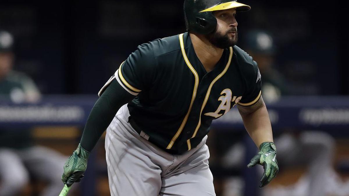 Oakland Athletics’ first baseman Yonder Alonso watches his RBI single off Tampa Bay Rays pitcher Erasmo Ramirez during the third inning of the first game of a doubleheader Saturday, June 10, 2017 in St. Petersburg, Fla.