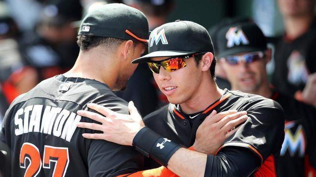 
Miami Marlins outfielders Giancarlo Stanton and Christian Yelich are shown before a spring training game against the St. Louis Cardinals at Roger Dean Stadium in Jupiter on Thursday, March 5, 2015.
