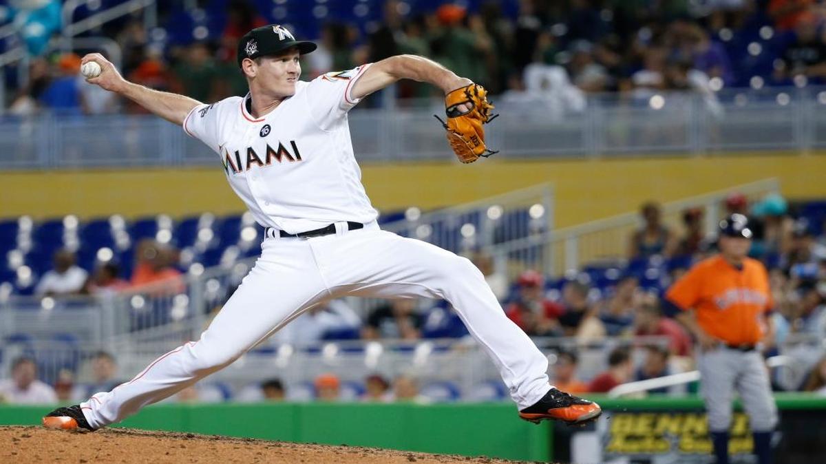 Miami Marlins' Brian Ellington delivers a pitch during the ninth inning of a baseball game against the Houston Astros, Wed., May 17, 2017, in Miami. The Astros defeated the Marlins 3-0. The Marlins recalled RHPs Ellington and Odrisamer Despaigne from Triple-A New Orleans.