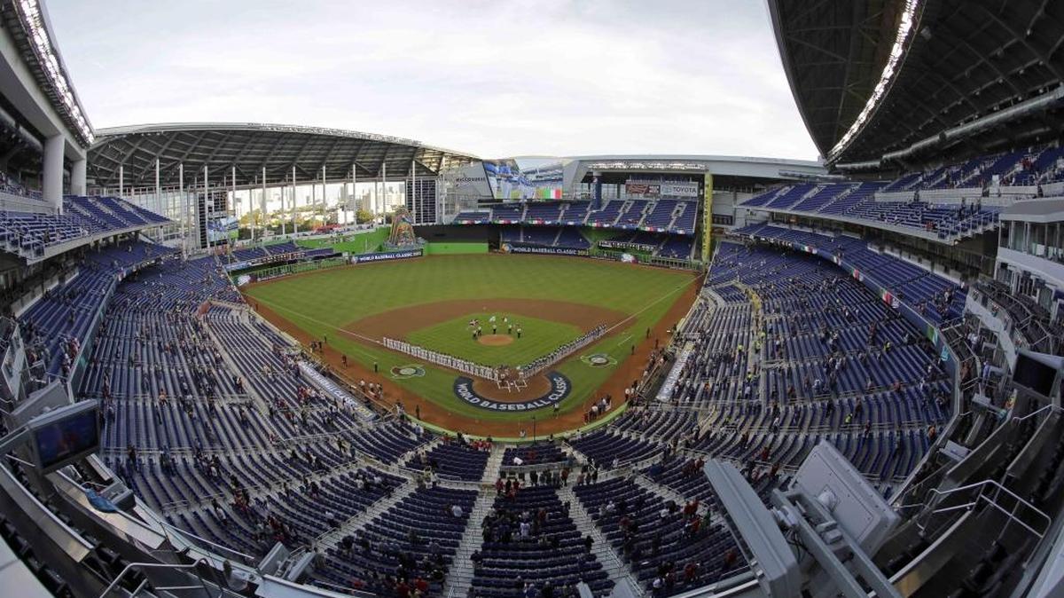 Italy and Puerto Rico stand during the playing of their national anthems at the World Baseball Classic at Marlins Park in Miami on March 13, 2013.