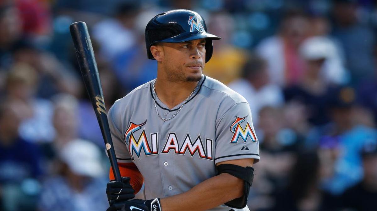 
Miami Marlins right fielder Giancarlo Stanton waits for a pitch against the Colorado Rockies in the seventh inning of a baseball game Saturday, June 6, 2015, in Denver. 

