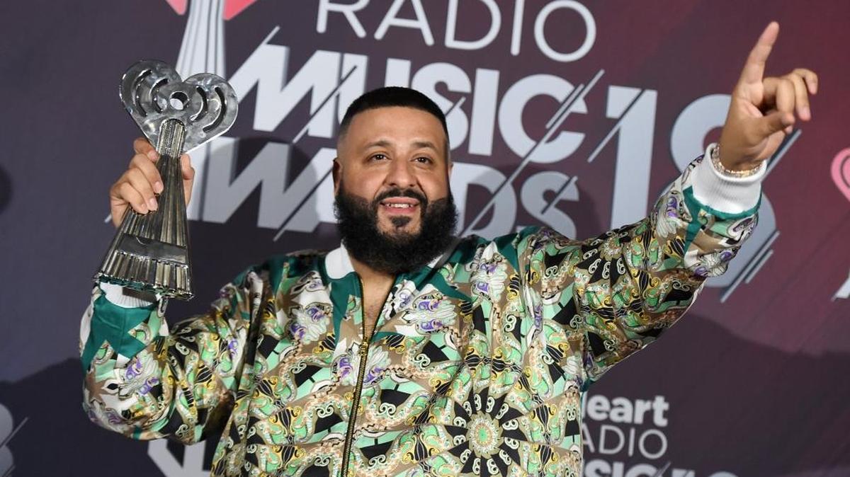 DJ Khaled poses in the press room with the hip-hop song of the year award for "Wild Thoughts" at the iHeartRadio Music Awards at The Forum in Inglewood, Calif. Demi Lovato celebrated six years sober at a concert in New York with tour mate and DJ Khaled, whose powerful brought the pop star to tears. Lovato performed Friday, March 16, 2018 at the Barclays Center in Brooklyn, New York, telling the audience March 15 was a proud day for her.