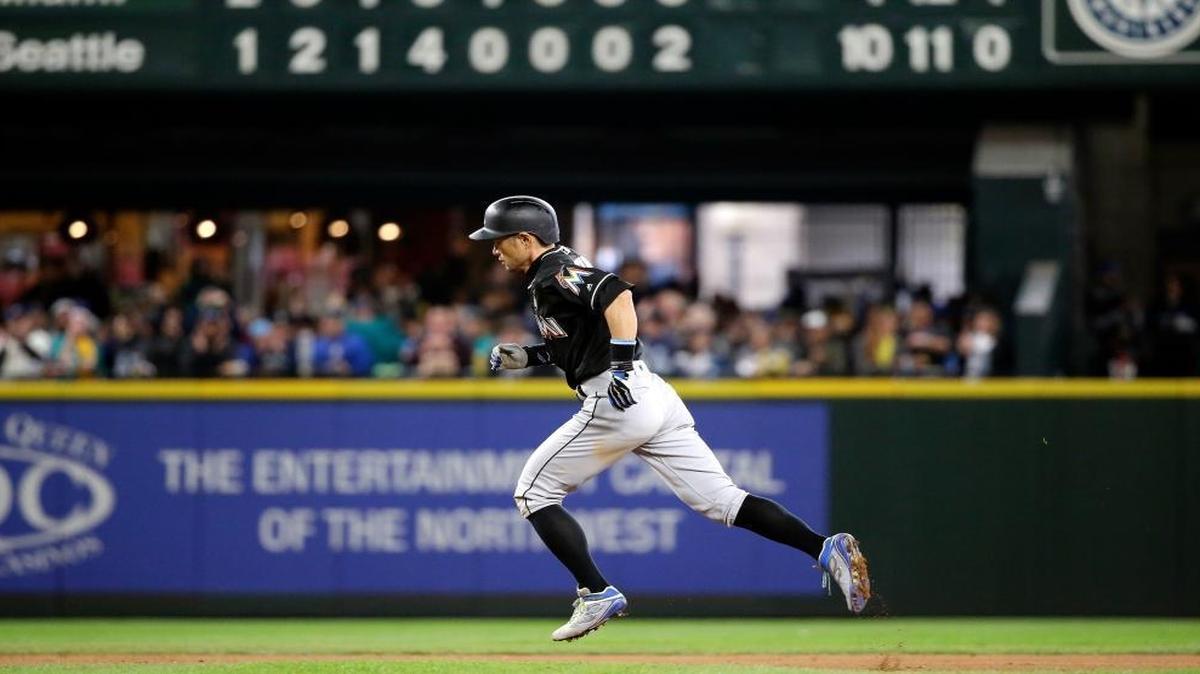Miami Marlins' Ichiro Suzuki rounds the bases on a home run against the Seattle Mariners in the ninth inning in a baseball game Wed., April 19, 2017, in Seattle.