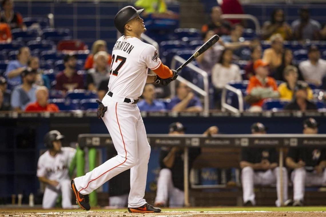 Miami Marlins outfielder Giancarlo Stanton hits a double in the bottom of the first inning as the Miami Marlins host the Arizona Diamondbacks at Marlins Park on Fri., June 2, 2017.