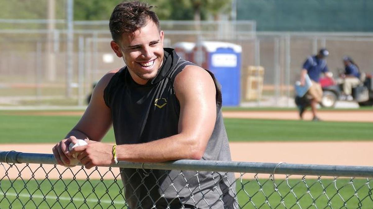 
Miami Marlins pitcher Jose Fernandez looks on during squad training workouts at Roger Dean Stadium on Tuesday, Feb. 24, 2015 in Jupiter, Fla. 
