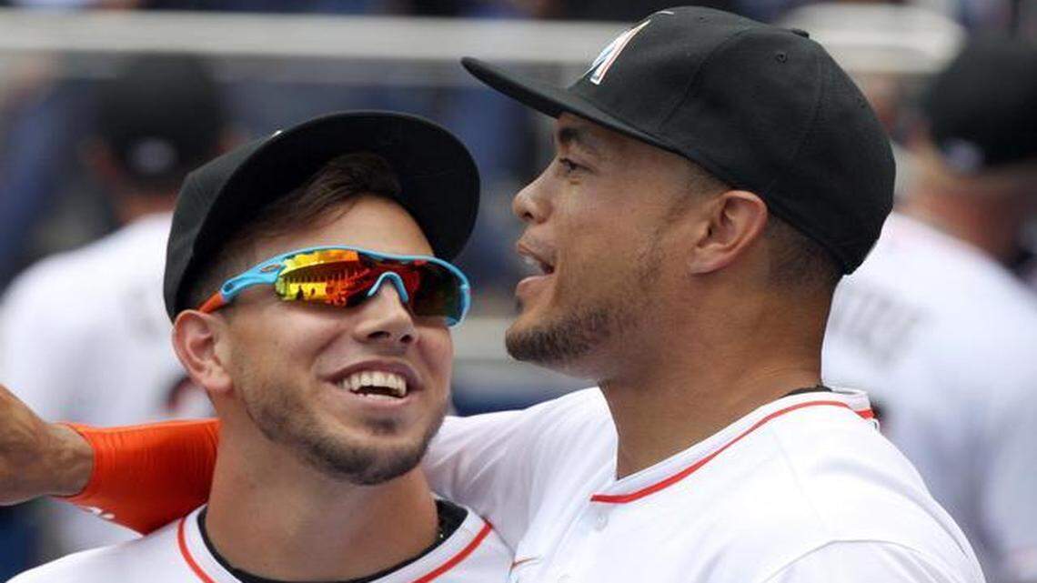 
Jose Fernandez shares a laugh with Giancarlo Stanton just before the Miami Marlins’ game against the Atlanta Braves at Marlins Park on Monday, April 6, 2015.
