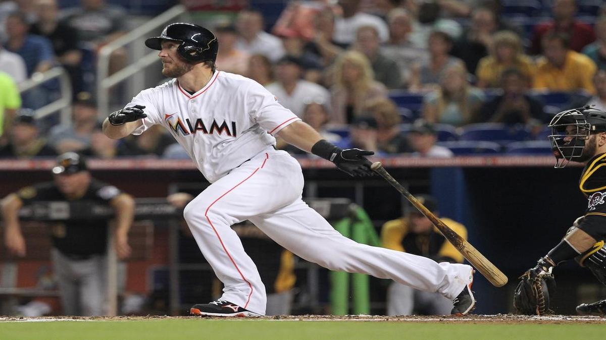 
Miami Marlins catcher Jeff Mathis hits an RBI single in the second inning of a Major League Baseball game against the Pittsburgh Pirates at Marlins Park in Miami on June 13, 2014.
