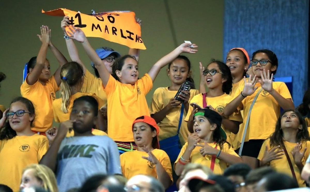Camp Day Kids show their support for the Marlins as the Miami Marlins play the Philadelphia Phillies at Marlins Park on Wed., July 19, 2017.