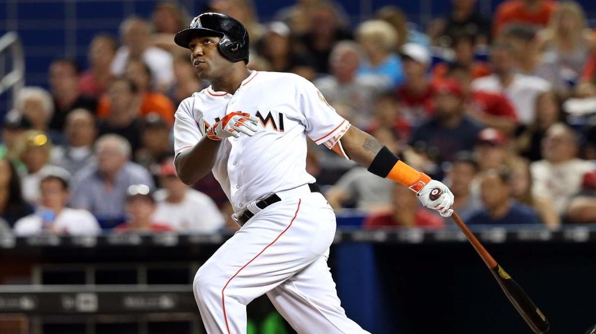 Miami Marlins' center fielder Marcell Ozuna hits a solo home run in the second inning of the Miami Marlins’ agame against the St. Louis Cardinals at Marlins Park in Miami on Friday, July 29, 2016.