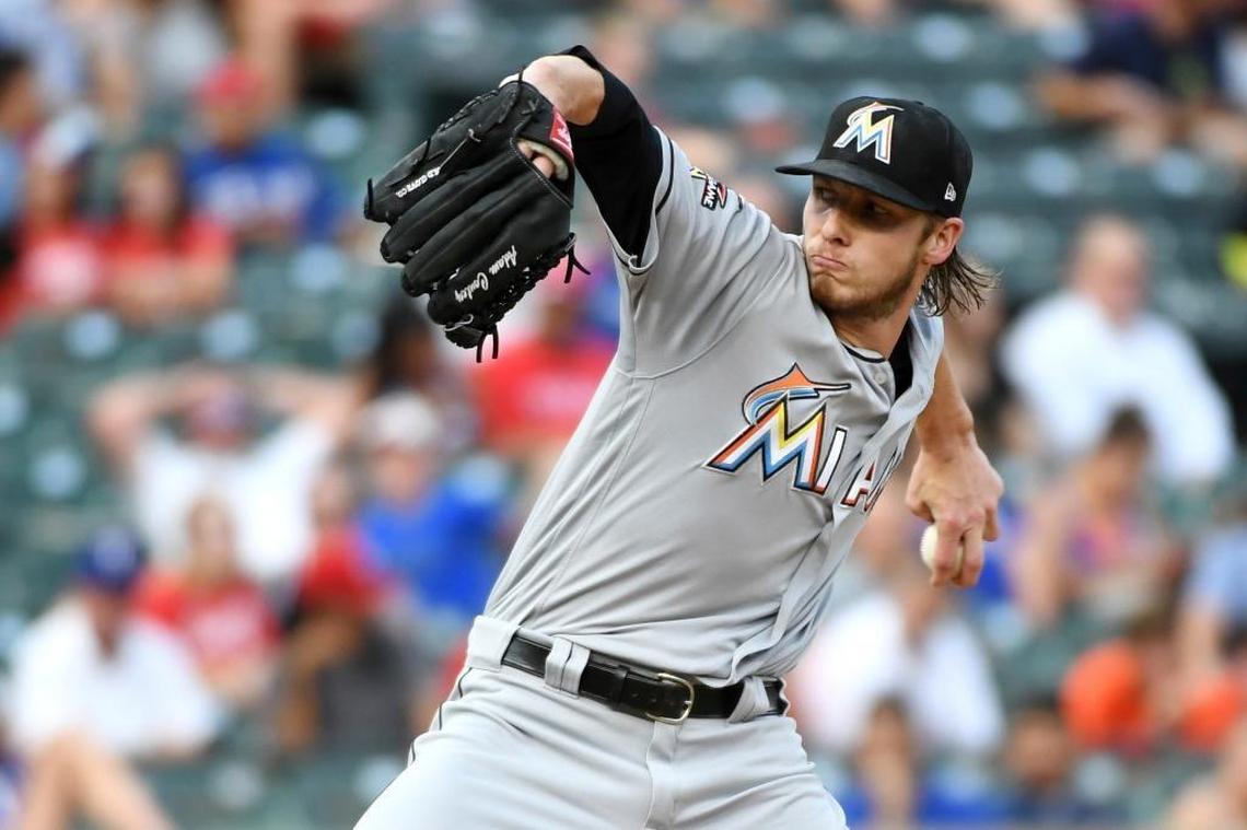 Miami Marlins starting pitcher Adam Conley throws during the first inning of a baseball game against the Texas Rangers, Monday, July 24, 2017, in Arlington, Texas.