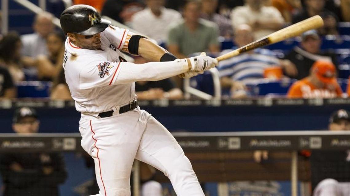 Miami Marlins third baseman Martin Prado flies out during the bottom of the eighth inning against the New York Mets, Tues., June 27, 2017, in Miami.