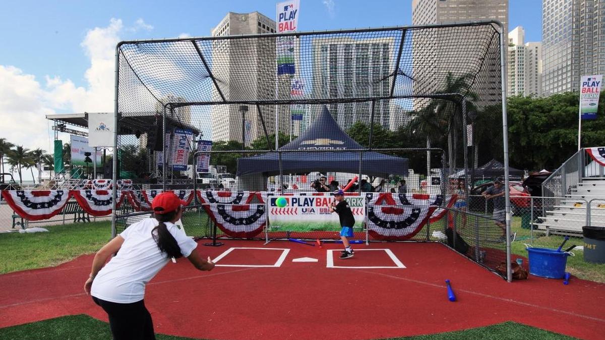 Alex Fernandez, 10, takes his cuts at the plate Saturday at the Play Ball All-Star Week attraction at Bayfront Park, which was created by Major League Baseball to provide opportunities for children and teenagers to play baseball and softball in a fun, welcoming setting.