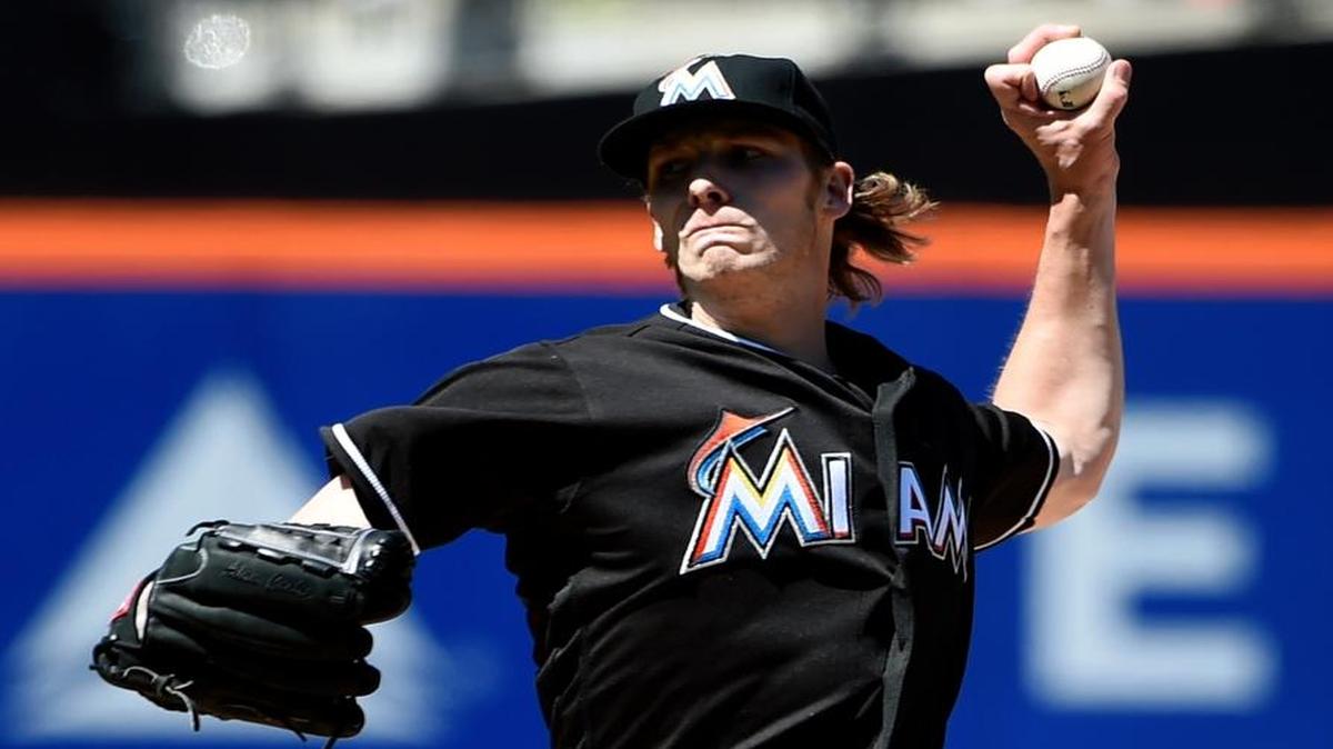Miami Marlins starting pitcher Adam Conley delivers against the New York Mets in the first inning of a baseball game, Wednesday, April 13, 2016, in New York.