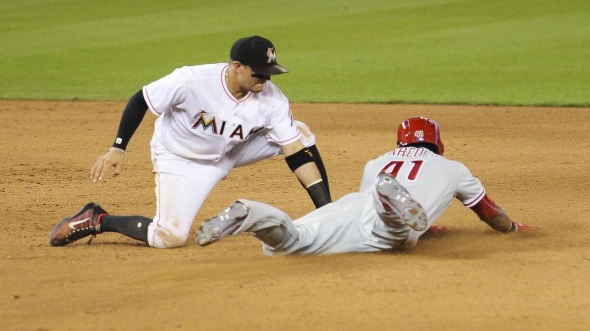 Philadelphia Phillies' Jimmy Paredes (41) tries to steal second base and gets tagged out by Miguel Rojas (19) in the seventh inning against the Miami Marlins at Marlins Park in Little Havana on Mon., Sept. 5, 2016.