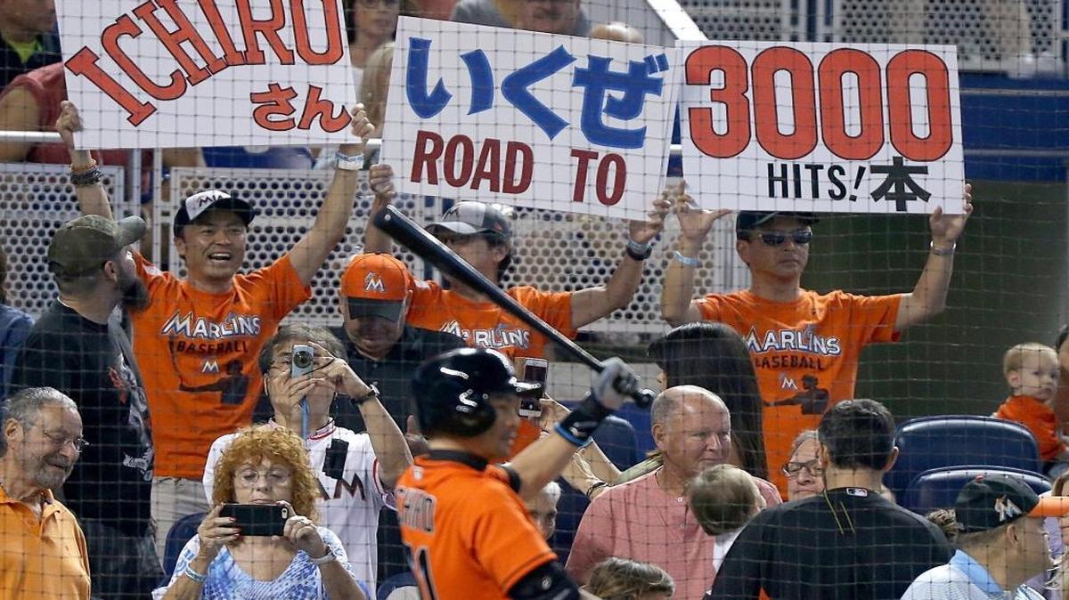 Marlins Ichiro Suzuki fans hold up their signs written in English and Japanese, as Ichiro warms up to bat on Sun., July 24, 2016. At the age 42, Ichiro Suzuki entered that weekend series against the Mets in Miami just four hits away from becoming the 30th player in major league history to reach that magical milestone. He entered Friday’s game just two hits shy.