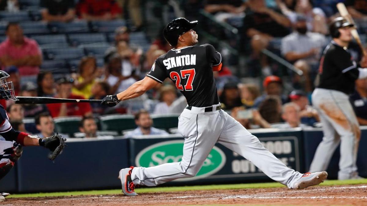 Miami Marlins pinch hitter Giancarlo Stanton (27) drive-in a run with sacrifice fly in the sixth inning of a baseball game against the Atlanta Braves in Atlanta, Mon., Sept. 12, 2016. Atlanta won 12-7.
