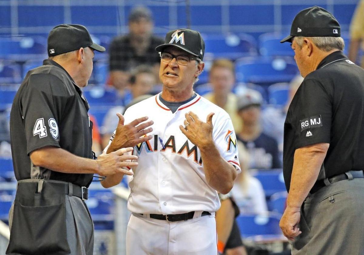 Marlins manager Don Mattingly argues with umpire Andy Fletcher before getting ejected as the Marlins play host to the St. Louis Cardinals at Marlins Park on Tues., May 9, 2017.