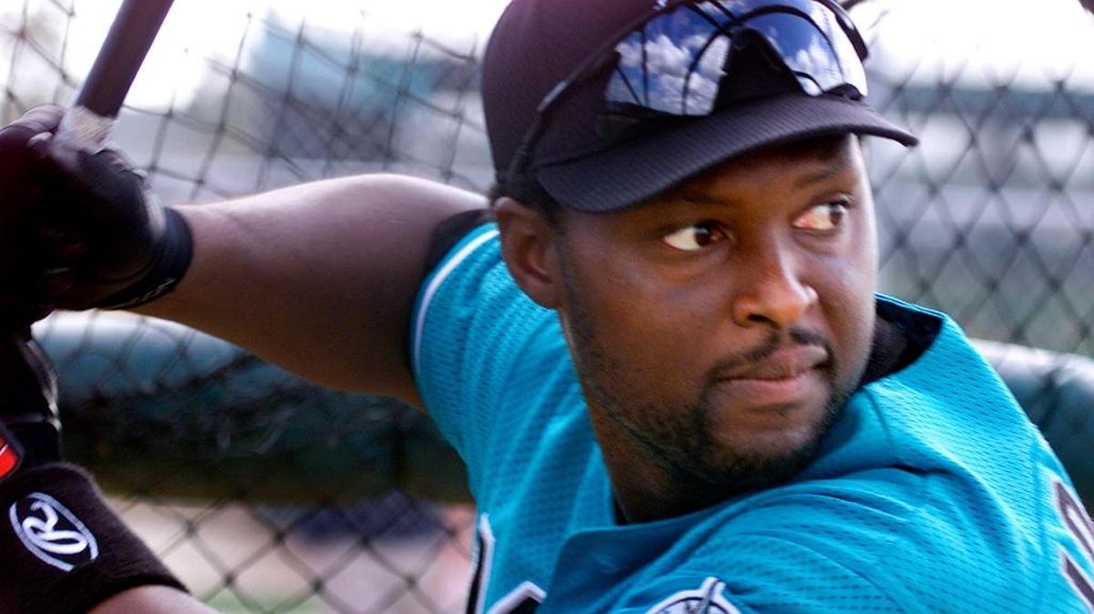 Charles Johnson takes his cuts at spring training in Viera before the 2001 season.