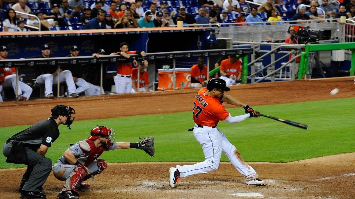 Miami Marlins right fielder Giancarlo Stanton (27) hits a home run during their game against the Cincinnati Reds at Marlins Park on July 10, 2016.