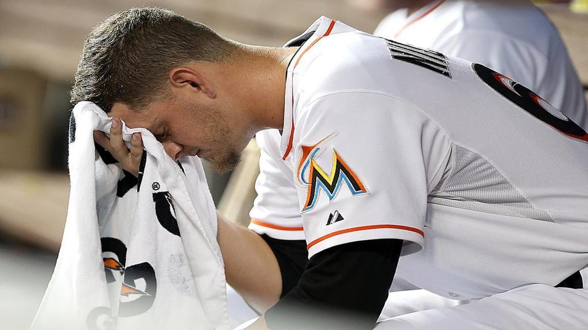 
Pitcher Justin Nicolino reacts in the dugout in the second inning of the Miami Marlins’s game against Pittsburgh Pirates at Marlins Park in Miami on Thursday, August 27, 2015.
