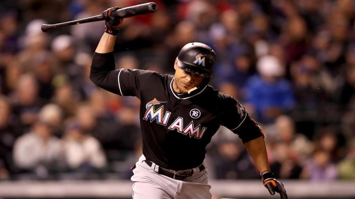 Miami Marlins Giancarlo Stanton (27) reacts to flying out in the sixth inning against the Colorado Rockies at Coors Field on September 26, 2017 in Denver, Colorado.
