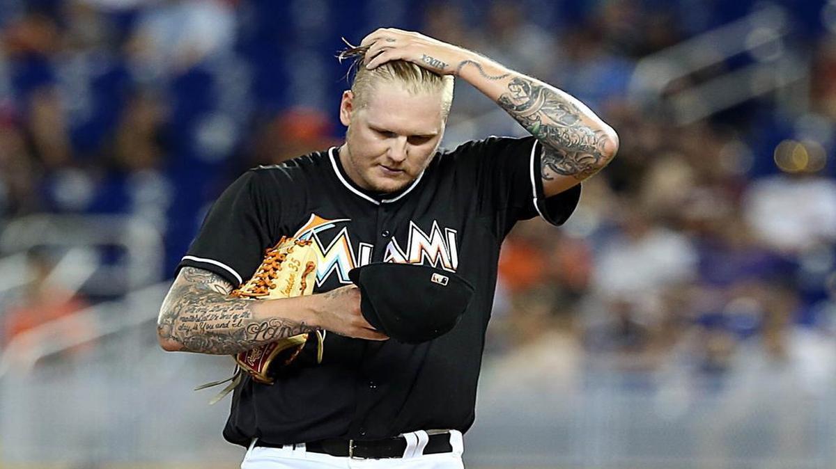 
Miami Marlins pitcher Mat Latos reacts in the second inning of the Marlins against Colorado Rockies game at the Marlins Park on Saturday, June 13, 2015.
