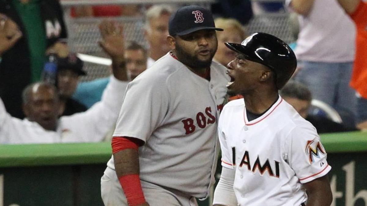 
Dee Gordon of the Miami Marlins reacts after hitting a triple in the 10th inning against the Boston Red Sox on Tuesday, Aug. 11, 2015 at Marlins Park in Miami.

