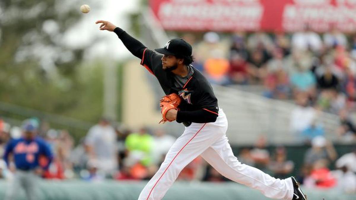 
Miami Marlins starting pitcher Henderson Alvarez throws during the first inning of an exhibition spring training baseball game against the New York Mets at Roger Dean Stadium in Jupiter on March 7, 2015.

