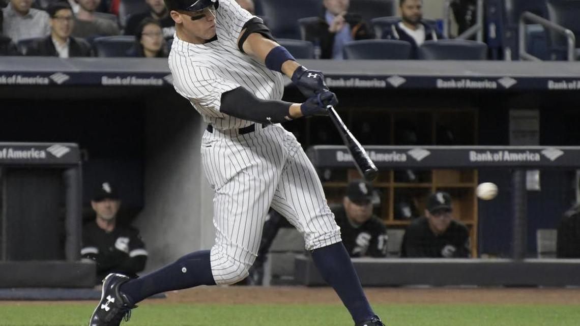 New York Yankees right fielder Aaron Judge hits a two-run home run during the fifth inning of a baseball game against the Chicago White Sox at Yankee Stadium in New York on April 17, 2017. Judge has transformed batting practice in the Bronx, where the Yankees are raising the top of their batting cage to accommodate the 6-foot-7 slugger.