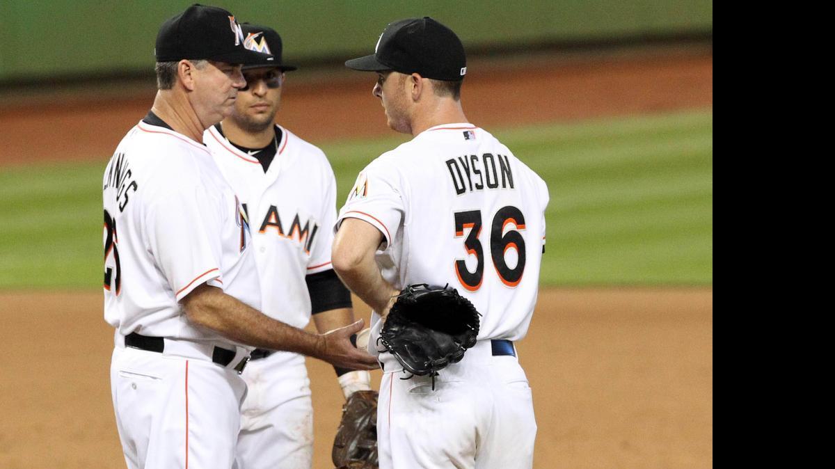Marlins manager Dan Jennings removes reliever Sam Dyson in the eighth inning during a 7-6 loss to the Diamondbacks at Marlins Park on Thursday, May 21, 2015.
