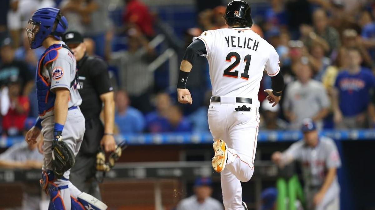 
Christian Yelich of the Miami Marlins scores on a walk off double by Martin Prado to defeat the New York Mets 6-5 in the eleventh inning of a baseball game at Marlins Park in Miami on Sept. 4, 2015.
