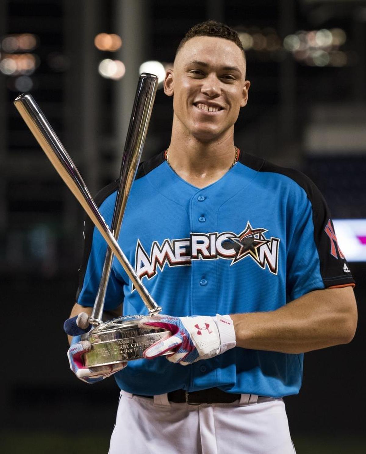 American League Aaron Judge of the New York Yankees holds the trophy after winning the MLB baseball All-Star Home Run Derby, Mon., July 10, 2017, at Marlins Park in Miami.