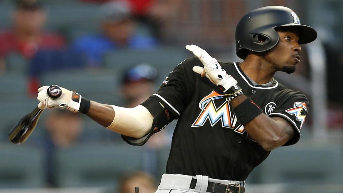 Miami Marlins second baseman Dee Gordon hits a leadoff triple in the first inning during the game against the Atlanta Braves at SunTrust Park on Sept. 7, 2017 in Atlanta.