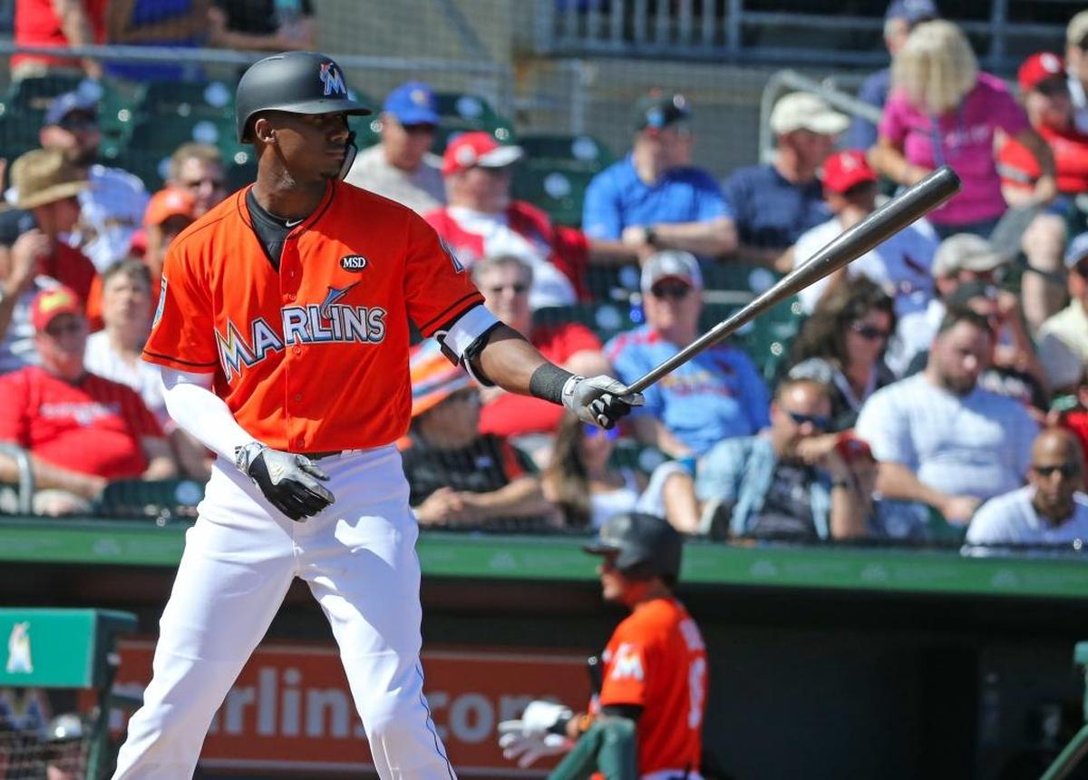 Miami Marlins outfielder Lewis Brinson bats during the third inning of a spring training baseball game at Roger Dean Chevrolet Stadium on Fri., Feb. 23, 2018 in Jupiter.