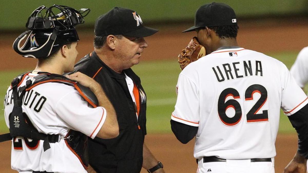 
Marlins pitcher Jose Urena talks to pitching coach Chuck Hernandez as catcher J.T. Realmuto looks on in the fourth inning against the St. Louis Cardinals on Tuesday, June 23, 2015 at Marlins Park in Miami.
