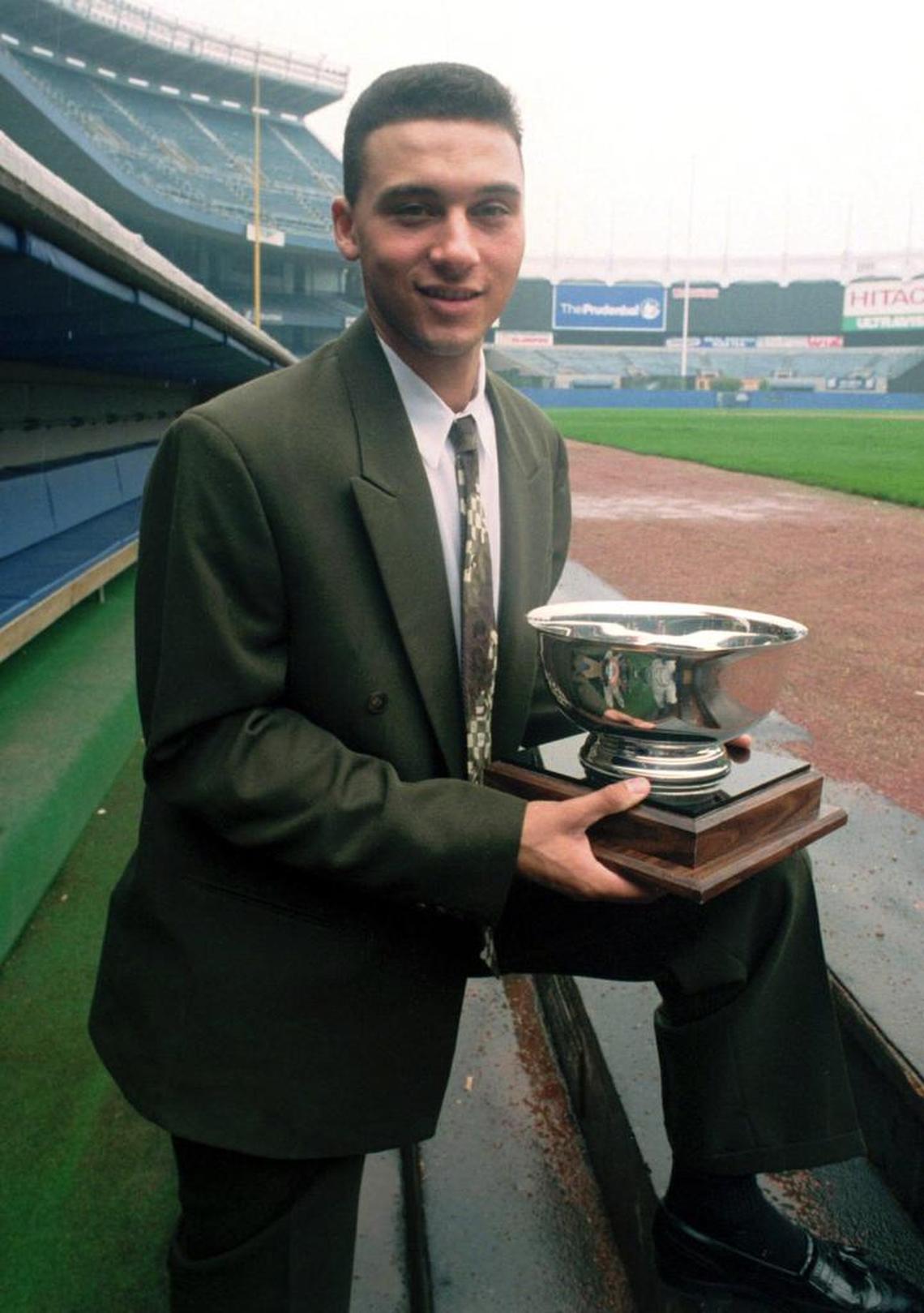 Back then he was just a prospect: In 1994, the New York Yankees’ Derek Jeter poses on the dugout steps at Yankee Stadium in New York after he was named Baseball America’s minor league player of the year.