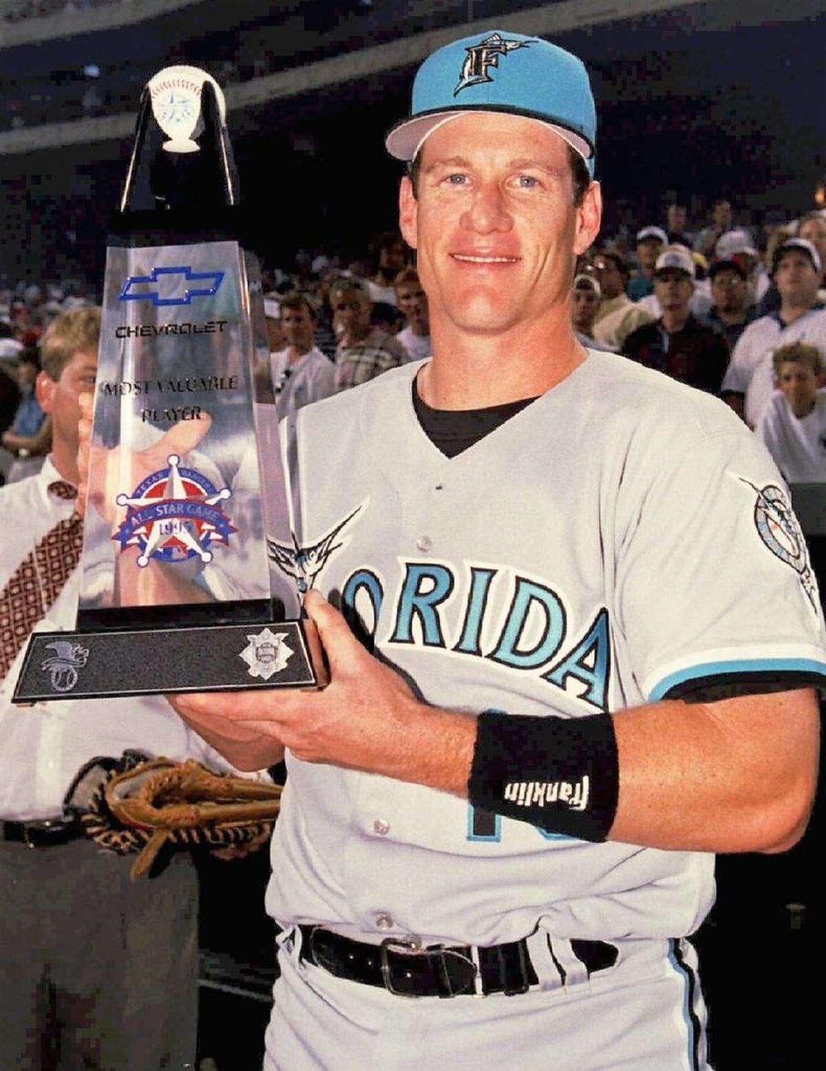 Jeff Conine of the Florida Marlins holds the All-Star MVP trophy following the 1995 All-Star Game at The Ballpark in Arlington, July 11.