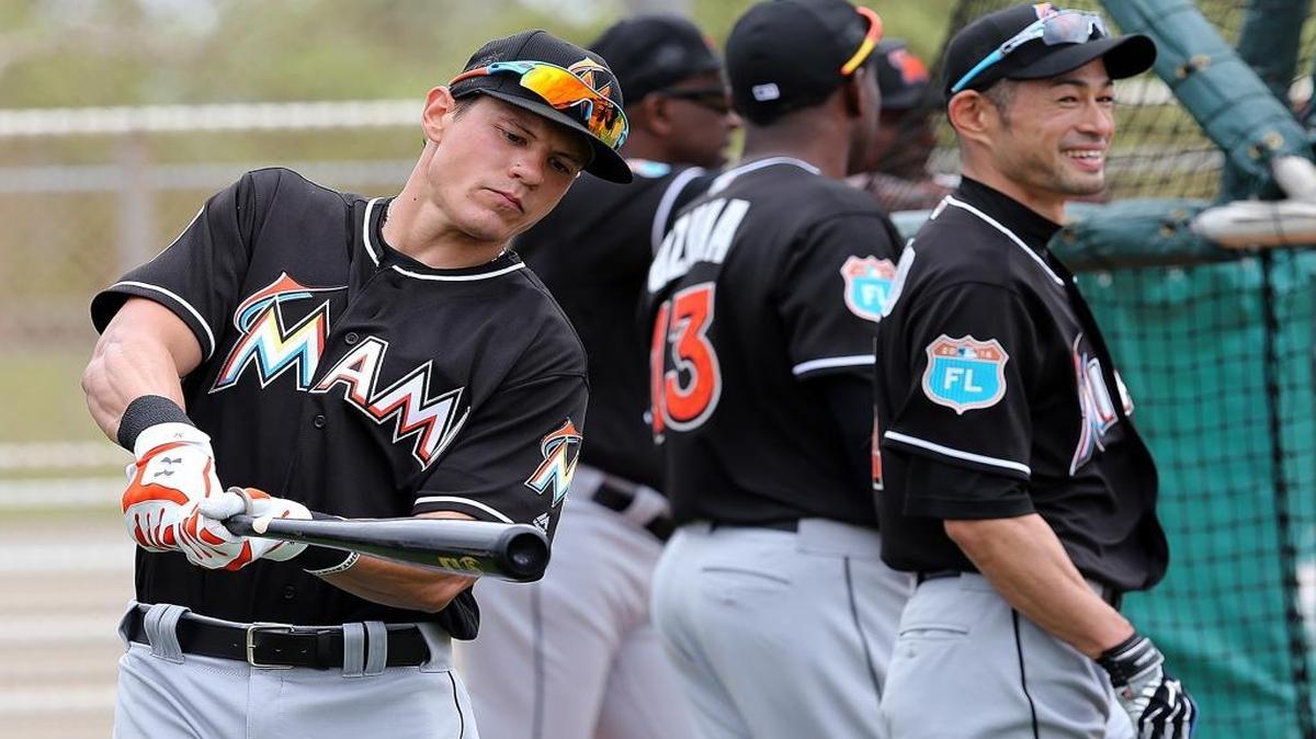 Derek Dietrich takes a swing during the first full squad practice of spring training at Roger Dean Stadium in Jupiter Tuesday, February 23, 2016.