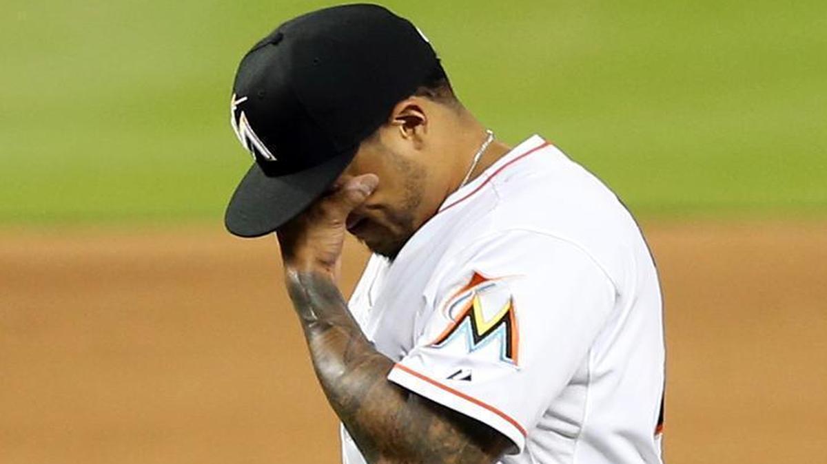 
Marlins closer A.J. Ramos reacts after being removed in the 11th inning after allowing four earned runs against the San Diego Padres at Marlins Park on Friday, July 31, 2015.
