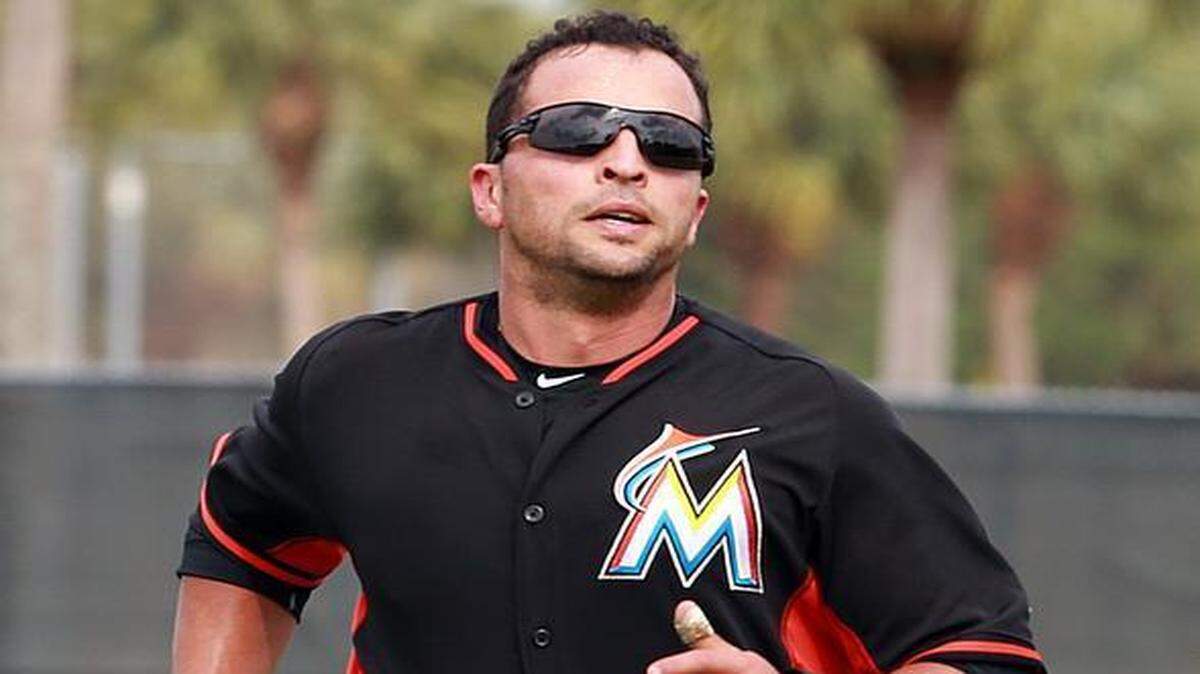 Miami Marlins infielder Martin Prado runs during spring training workouts at Roger Dean Stadium in Jupiter on Tuesday, Feb. 24, 2015.
